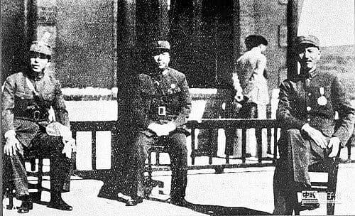A photograph of Chiang Kai-shek (right), Chang Hsueh-liang (left), and Yang Hucheng (center)—the key figures of the Xi'an Incident—taken together before the event.